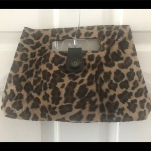 Animal Print Faux Fur Hand Bag
12 by 2.5 by 8